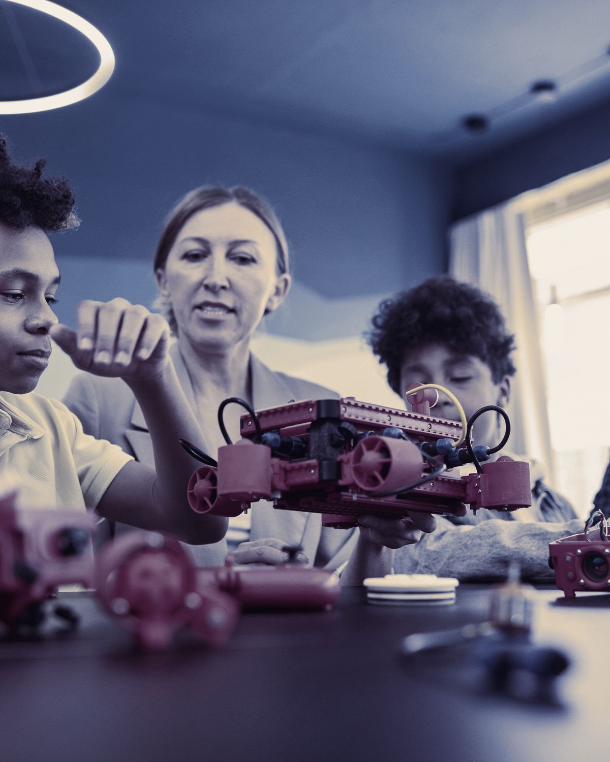 Young learners building robots in the Gravity STEM Academy
