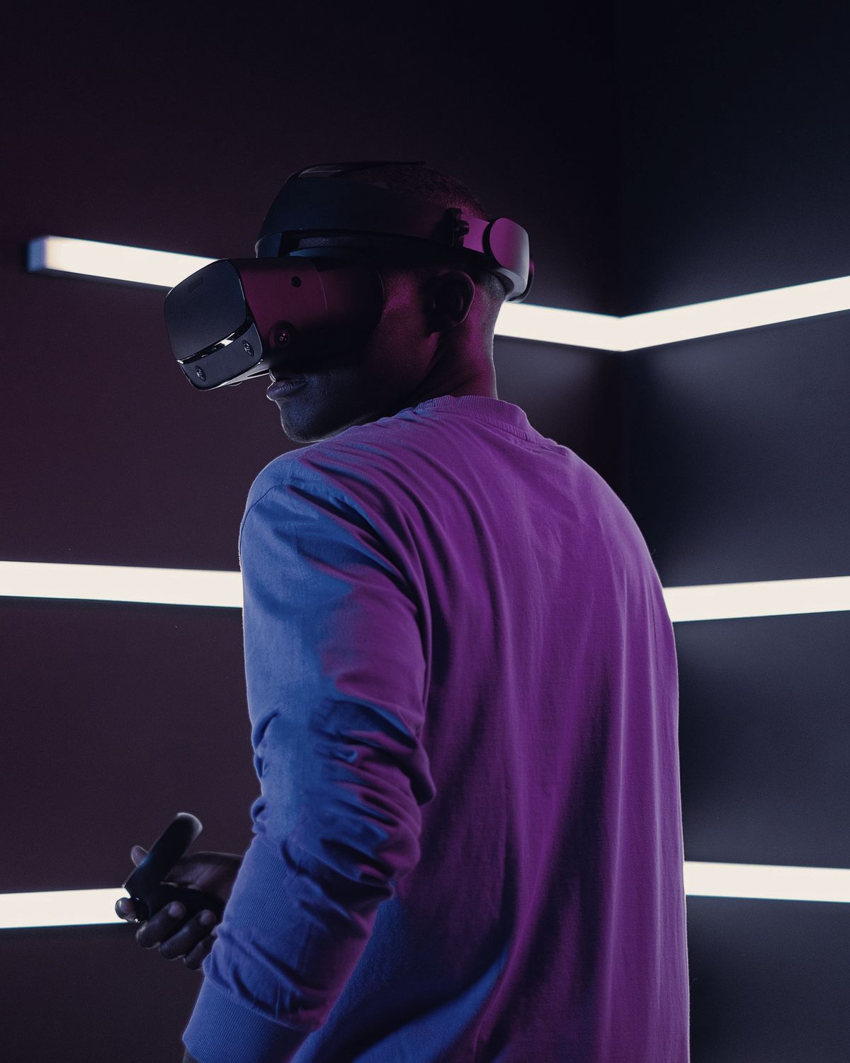 Guests in VR headsets exploring immersive worlds at Gravity Arena